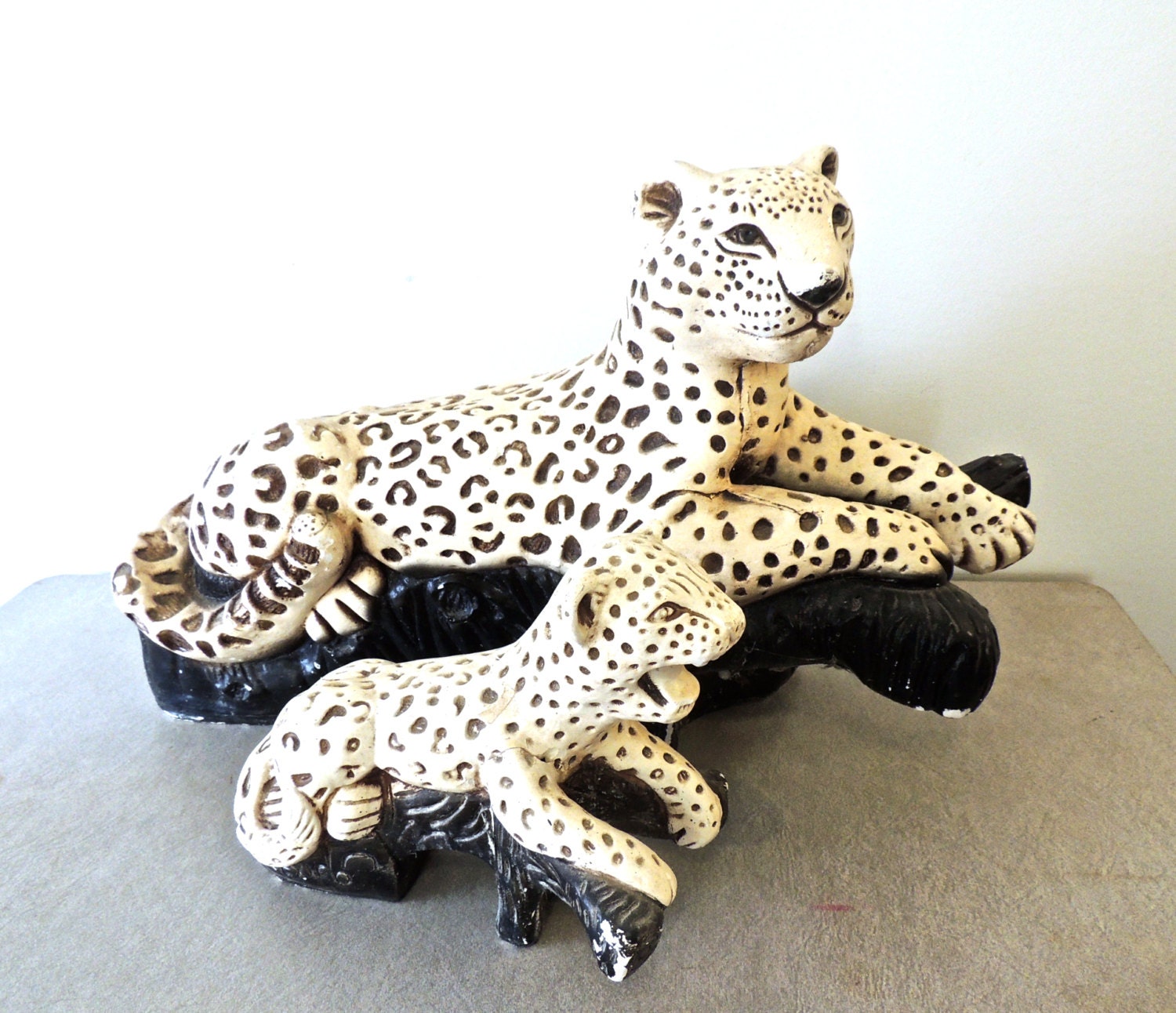 vintage ceramic leopard statue