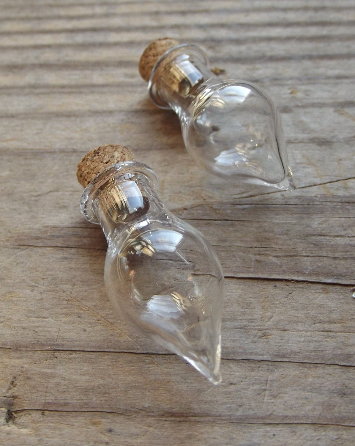 2 small Tear drop shaped cleart glass apothecary jar with cork