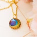 Golden peacock feather necklace