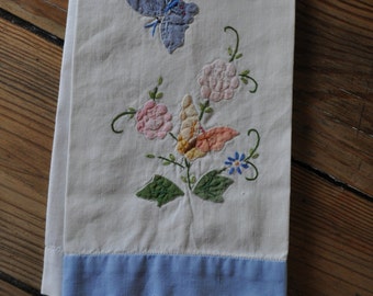 Vintage appliqued and embroidered tea towel