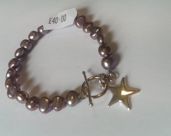 Freshwater pearl bracelet, dusky pink, star charm