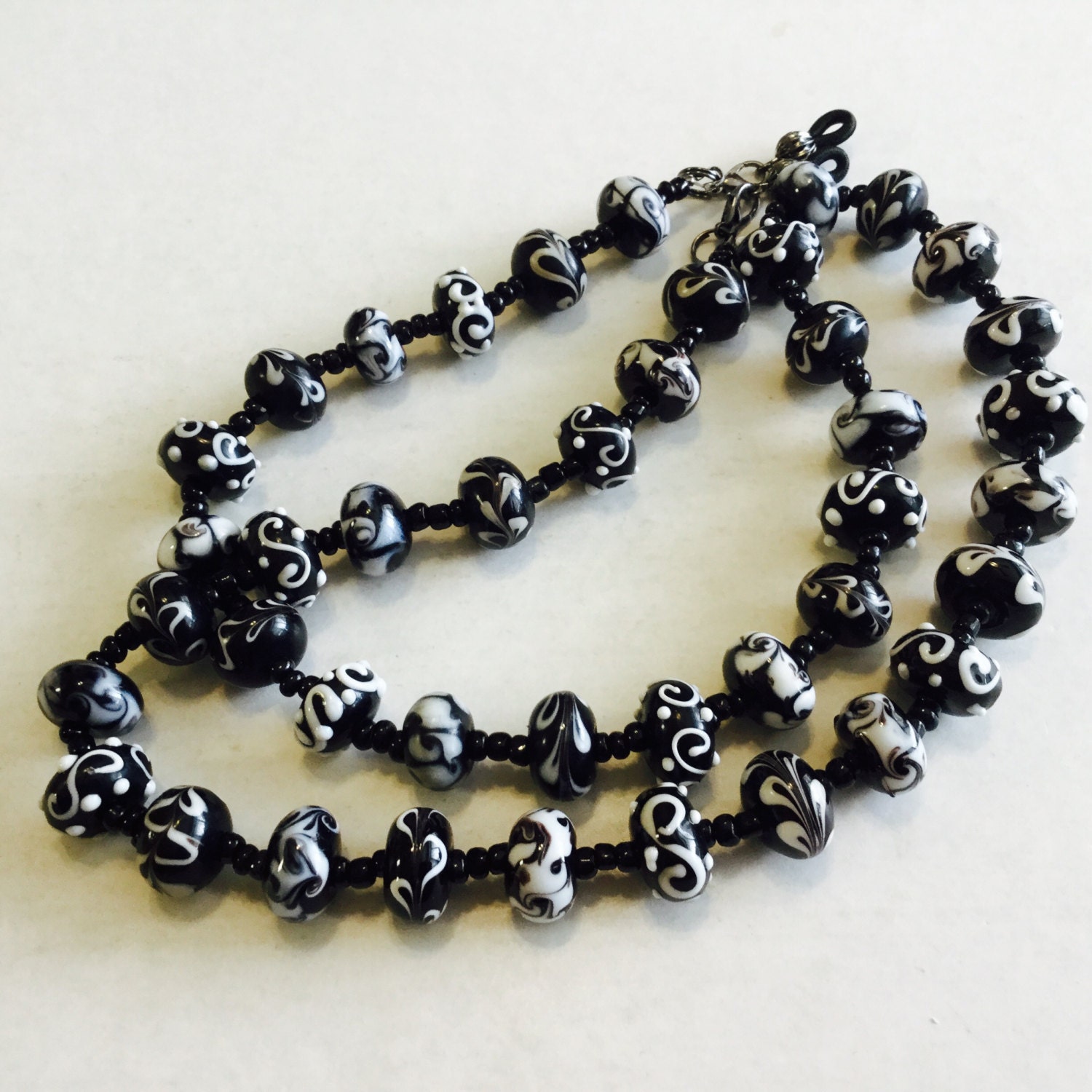 Black/White Glass Swirl Eyeglass ChainSunglass Chain