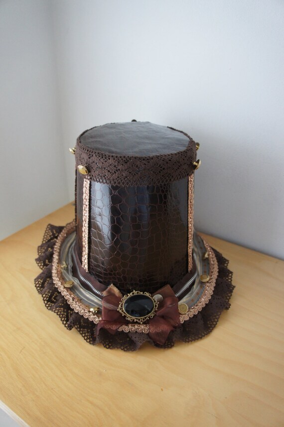 One of A Kind Steampunk High Top Hat With Brown Repile Skin Effect And Lace , Braid And Organza Ribbon Detailing With Ornate Buttons by IndustriousImaginare steampunk buy now online One of A Kind Steampunk High Top Hat With Brown Repile Skin Effect And Lace , Braid And Organza Ribbon Detailing With Ornate Buttons by IndustriousImaginare steampunk buy now online