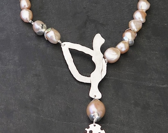 Silver necklace massif and pink Baroque pearls