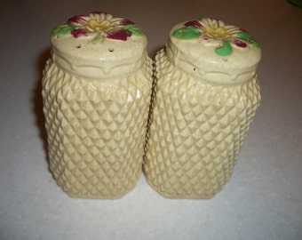 Vintage Salt and Pepper Shakers...Overall Texture...Flower Design... 3/4 inches Tall...Made in Japan