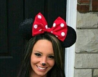 Minnie Mouse ears with a red or pink polka dot bow. One size fits most 4yrs to adult.