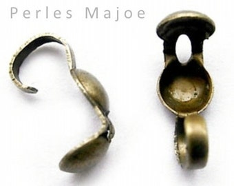 Lot de 20 caches noeud couleur bronze dimensions 9 x 3 mm