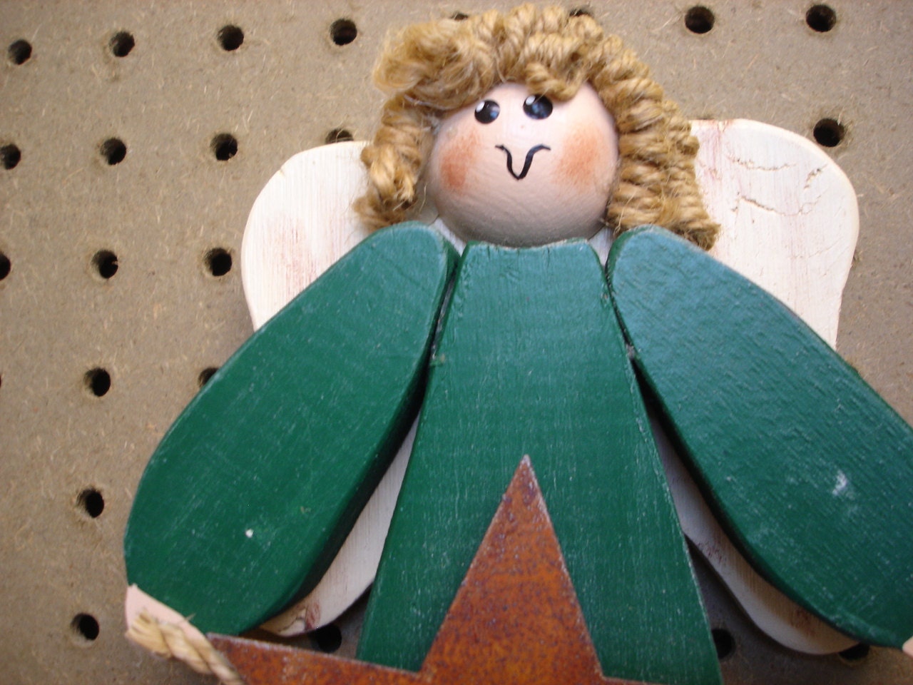 Wooden Green Angel with Rustic Star Accent Wall by