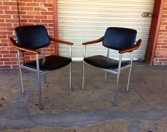 Pair of Mid Century Thonet Chairs with Black Vinyl Upholstery and walnut Armrests.