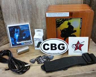 The Cigar Box Guitar Player's Gift Pack - a box full of CBG essentials & accessories! (Product # 90-040-01)