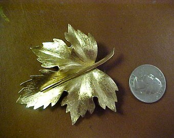 Signed (Boucher) gold tone leaf brooch