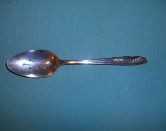 One (1), 8 1/2" Silver Plate, Pierced Table (serving) Spoon, from Wm Rogers (eagle) / International Silver, in the Lady Fair 1957 Pattern
