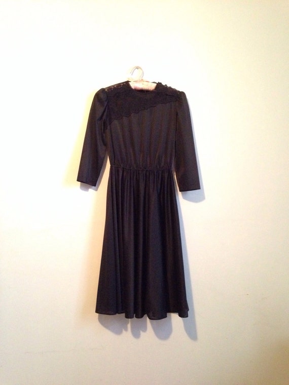 70s black midi dress with lace detail cinched waist by GunStreet
