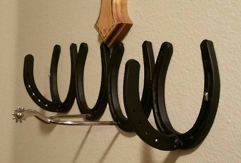 4 horseshoe wall mount hat and coat rack. With spur hook.