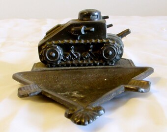 metal ashtrays with small military tank attached
