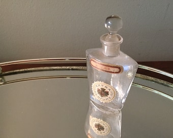 Antique perfume bottle, early 1900's, " Lilas" . Small glass art bottle with stopper.