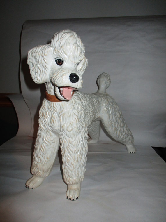 white ceramic poodle