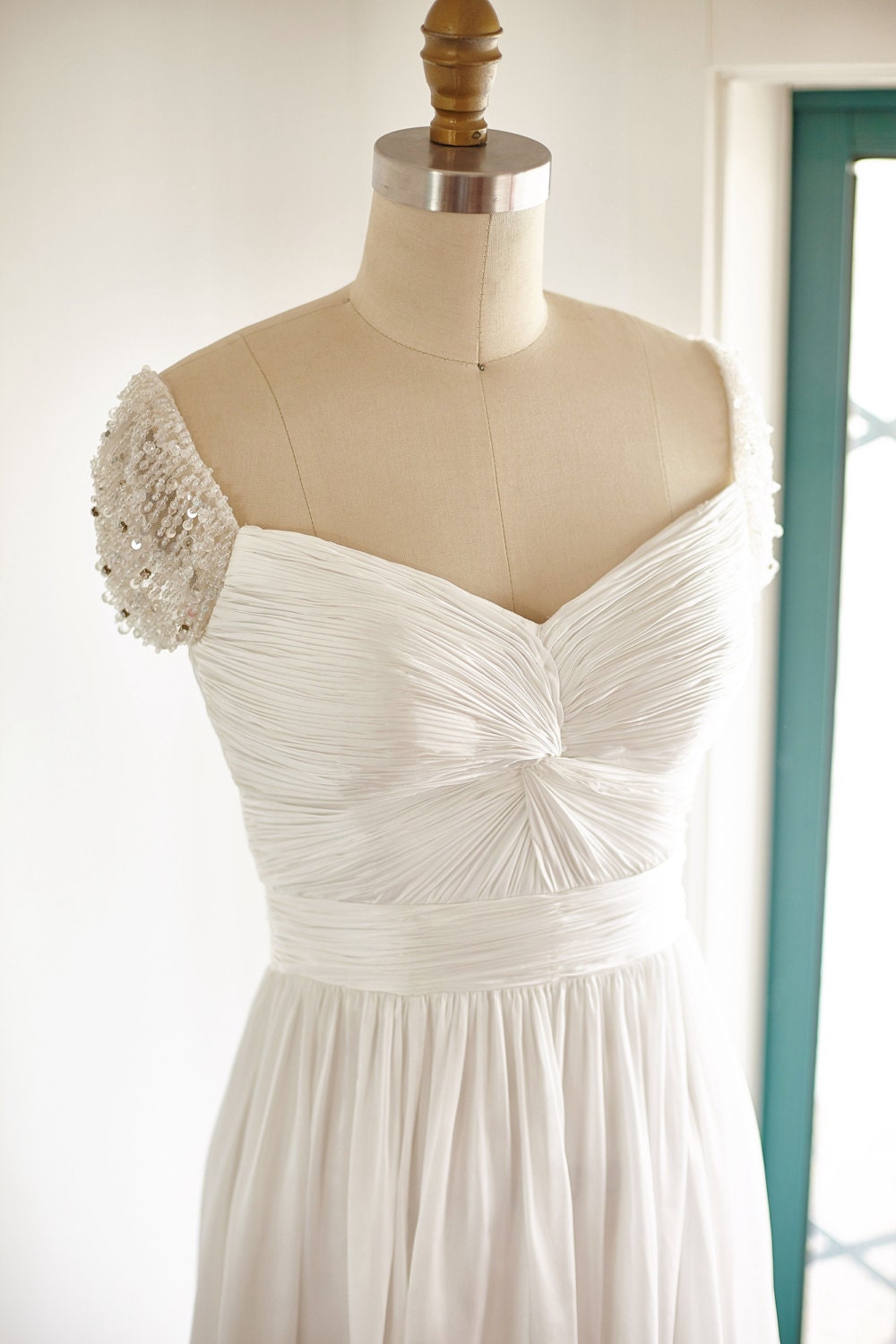 pearl cap sleeve wedding dress