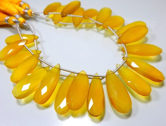 yellow chalcedony faceted pear shape size 9x21 to 11x30 mm approx 100 top quality yellow chalcedony faceted pear shape size 9x21 to 11x30 mm approx 100 top quality