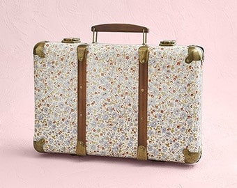 The retro suitcase with flowers