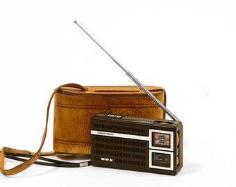 DUX 1070 vintage transistor radio with leather pouch. 1970s not working but great cosmetical condition.