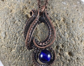 Elegant Swirls Copper Pendant with Dark Blue Accent Bead Includes Chain