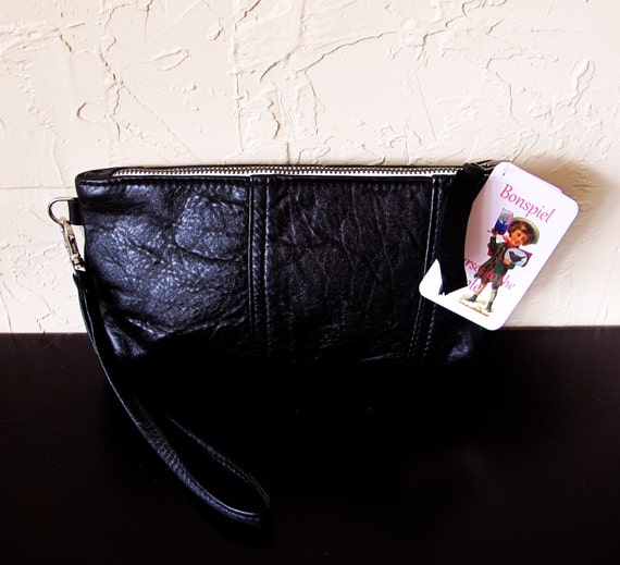 black leather wristlet clutch bag