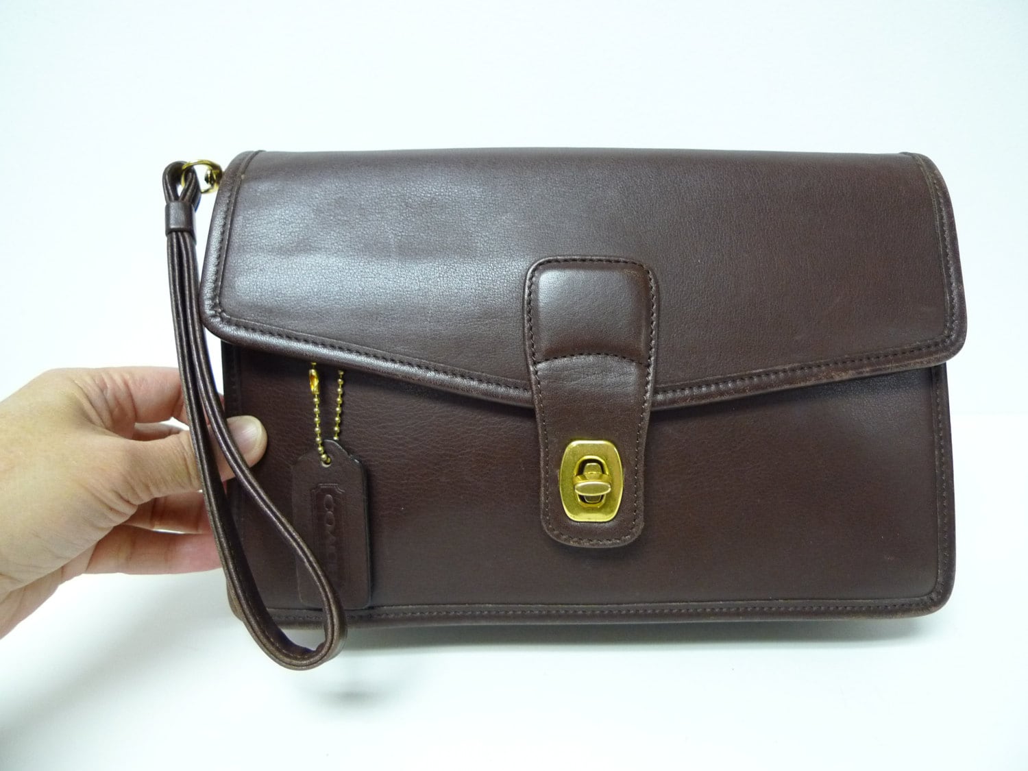 COACH . dark brown leather clutch . purse . wristlet