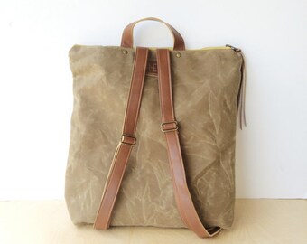 bucket backpack • waxed canvas backpack • light brown waxed canvas - canvas and leather backpack - brown leather • scout