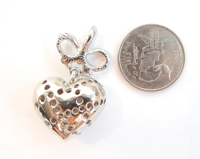 Silver-tone Dimensional Heart with Blue Rhinestone Pendant