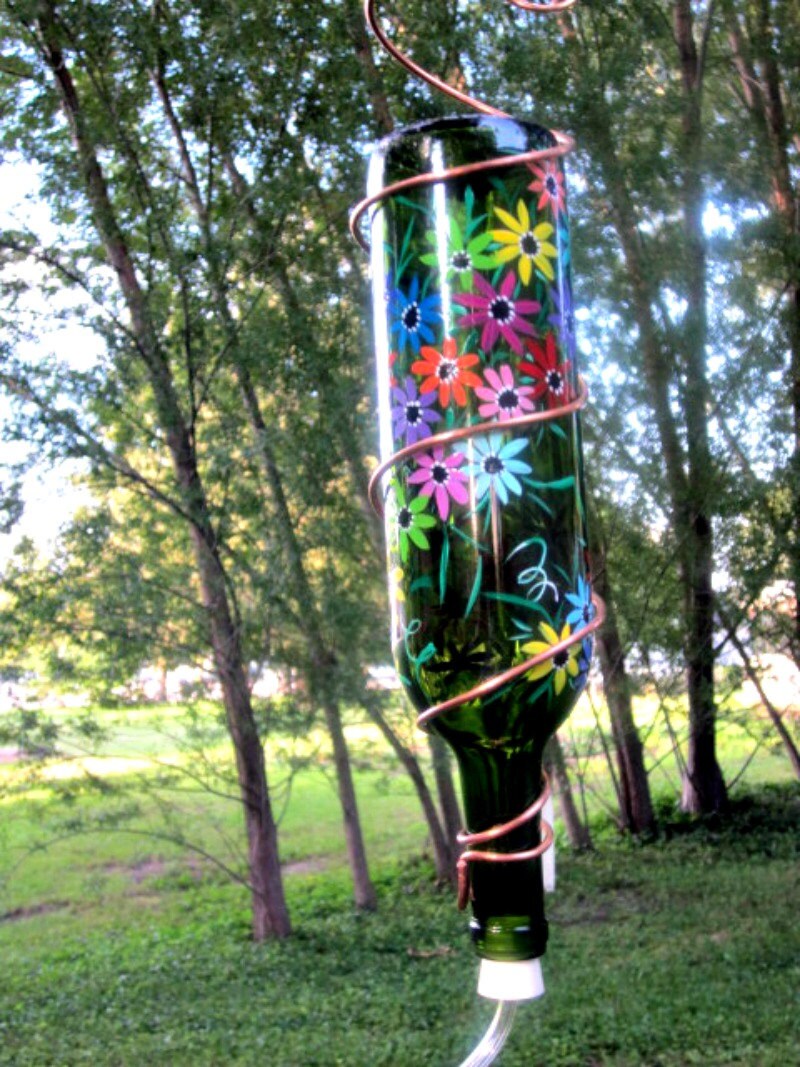 hummingbird feeder recycled dark green wine bottle hand hummingbird feeder recycled dark green wine bottle hand