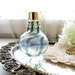 Vintage Perfume Bottle Small Perfume Bottle Vanity Bottle Murano Glass Blue Swirl Glass from AllieEtCie