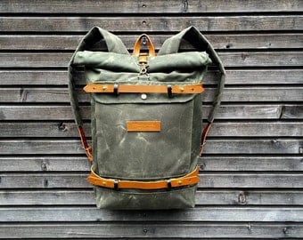 Waxed canvas rucksack/backpack with roll up top and waxed canvas shoulderstraps