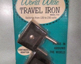 GE World Wide TRAVEL IRON Continental Adaptor Vintage Plugs In Around The World British Adaptor General Electric kitschy gadget