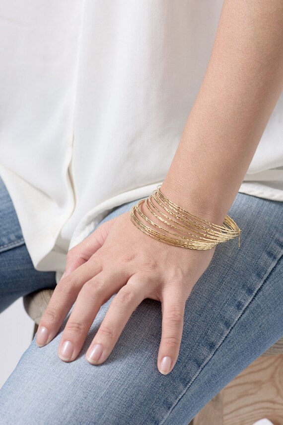 Hand crafted thin bangle bracelets in gold gold bangle