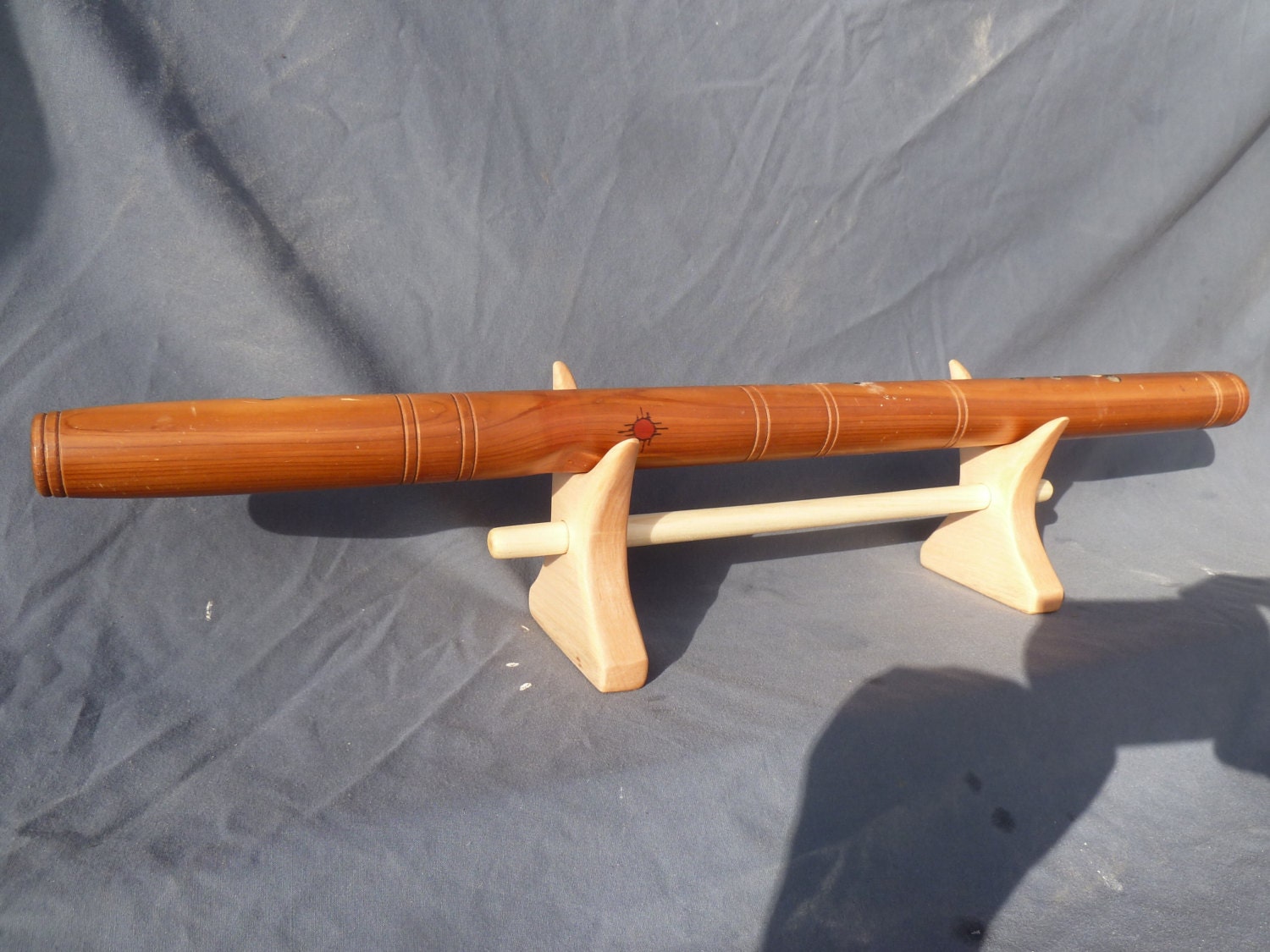 Maple flute stand holds 1 native american flute