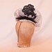 Handmade white side hat with black lace overlay and tulle frill