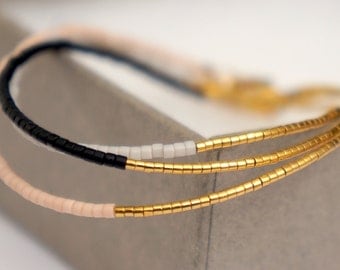 Delicate Miyuki beaded bracelet // Dainty bracelet with 24 carat gold plated beads - Gold plated lobster clasp