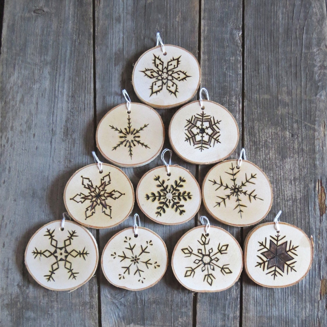Wood burned Christmas tree ornaments snowflakes by REEckerson