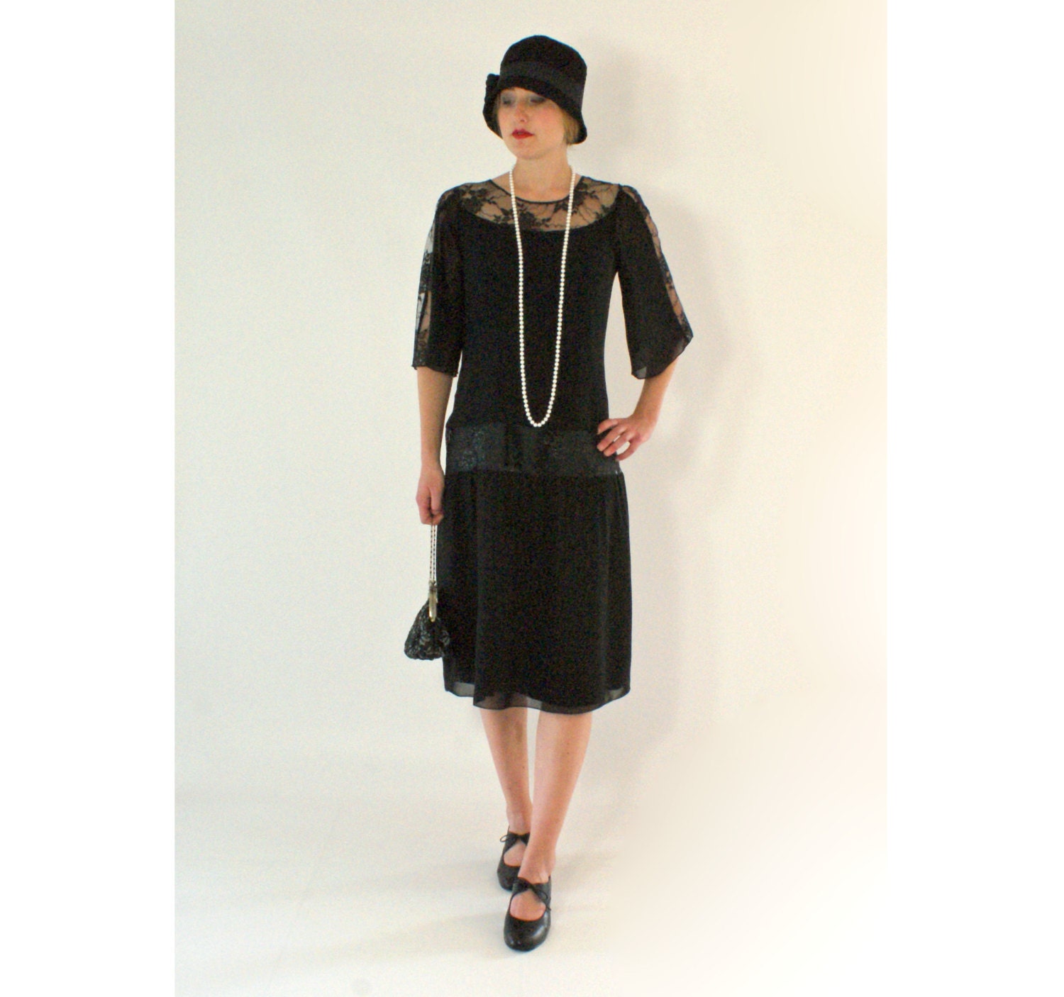 Black 1920s chiffon and lace dress elbow-length sleeves