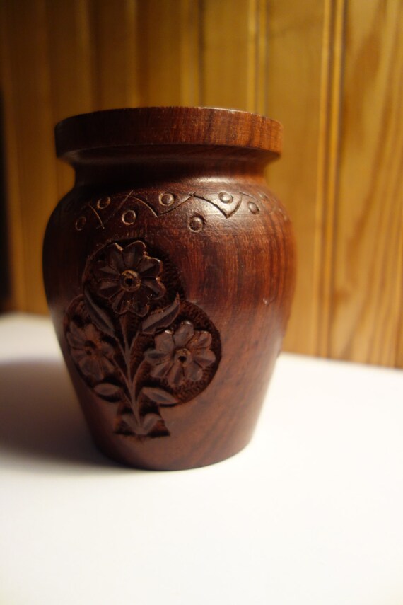 Carved small wooden vase