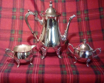 Silver plate coffee pot creamer and sugar bowl