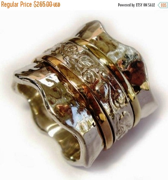 Spinner ring with flowers