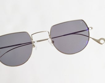 Items similar to Vintage 70s style sunglasses by Ultra Eyewear Ivory ...