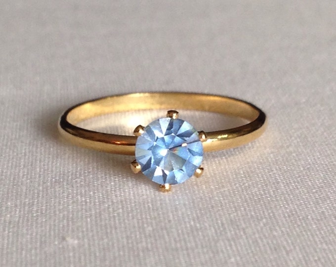 Storewide 25% Off SALE Vintage Gold Tone Baby Blue Topaz Style Designer Solitare Ring Featuring Elegant Petite Prong Design