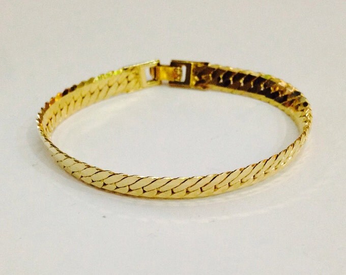 Storewide 25% Off SALE Vintage Gold Tone Herringbone Woven Designer Bracelet Featuring Hidden Clasp Design Closure