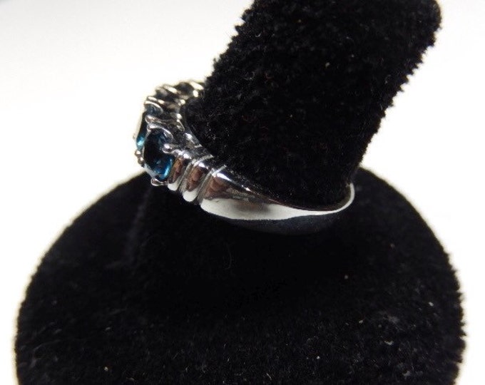 Storewide 25% Off SALE Vintage Sterling Silver Blue Stone Designer Cocktail Ring Featuring Elegant Channel Prong Set Design