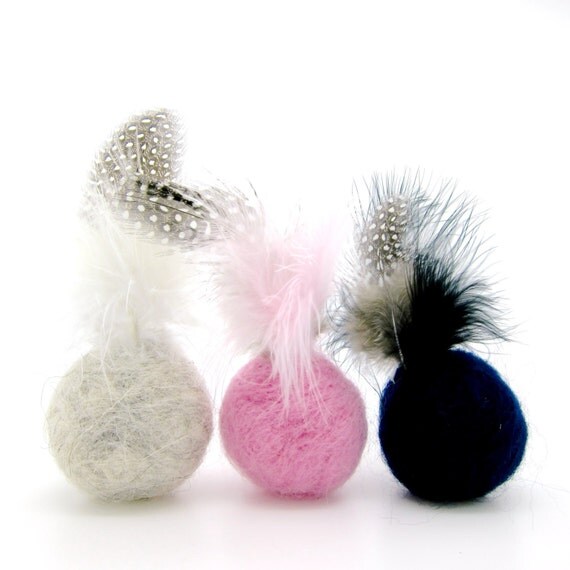 Felted wool ball cat toy with feathers