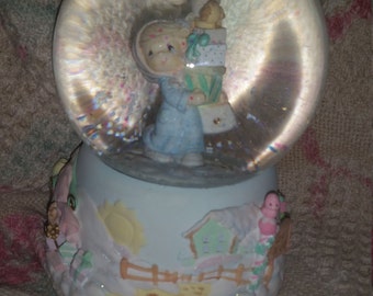precious moments snow globe love one another