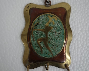 80's pendant, brass with crushed torquoise, trying to be a belt buckle? dimension 2.75" in length